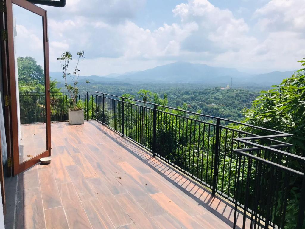 The balcony of the Superior Family Room, open to the mountain view