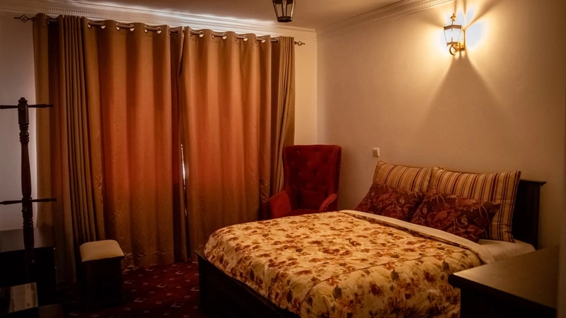 A Superior Double Room at Little England lit for the evening