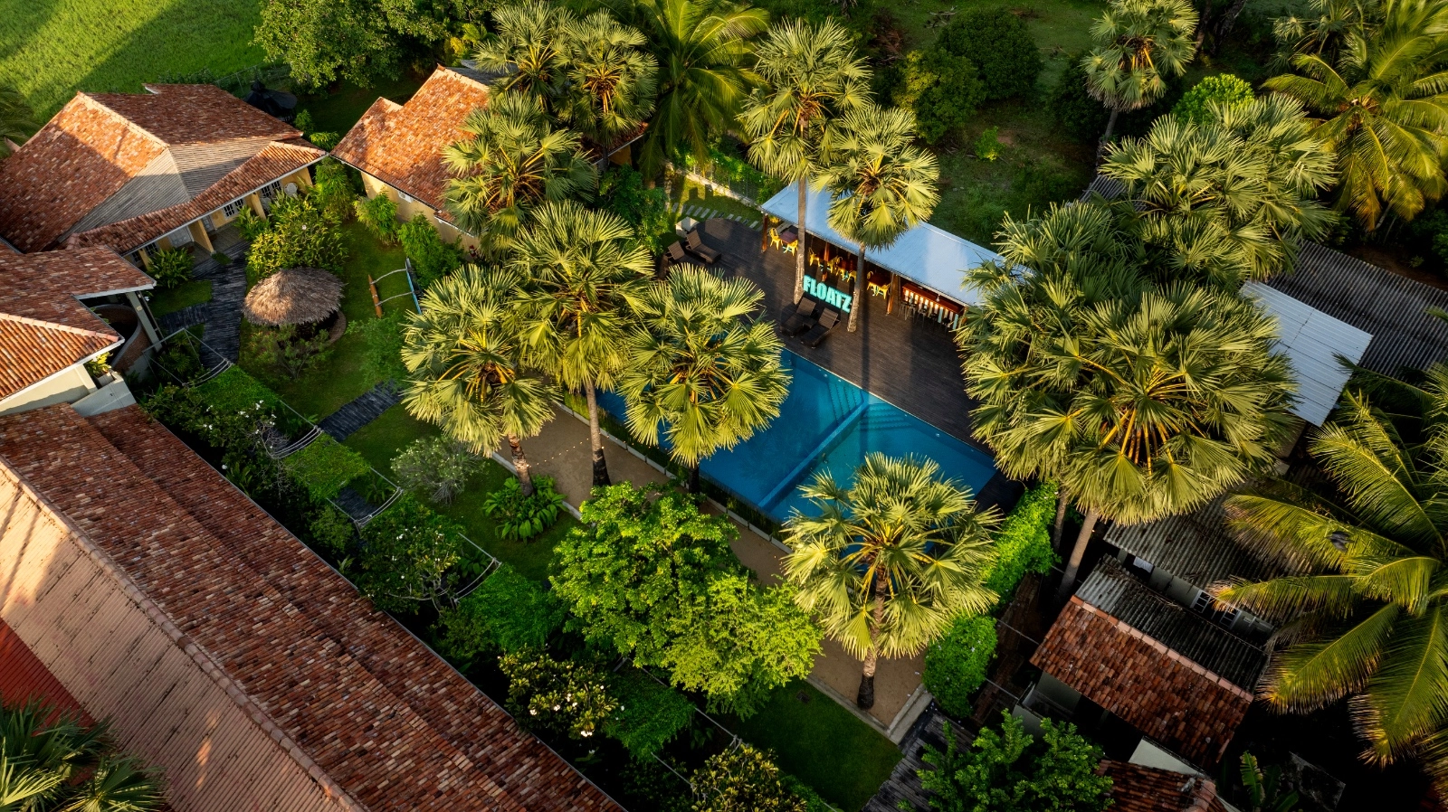 The pool at Palmera Eco Resort seen from above