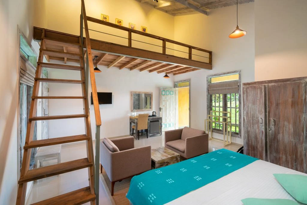 The attic loft above the sitting area of a Deluxe Family Chalet