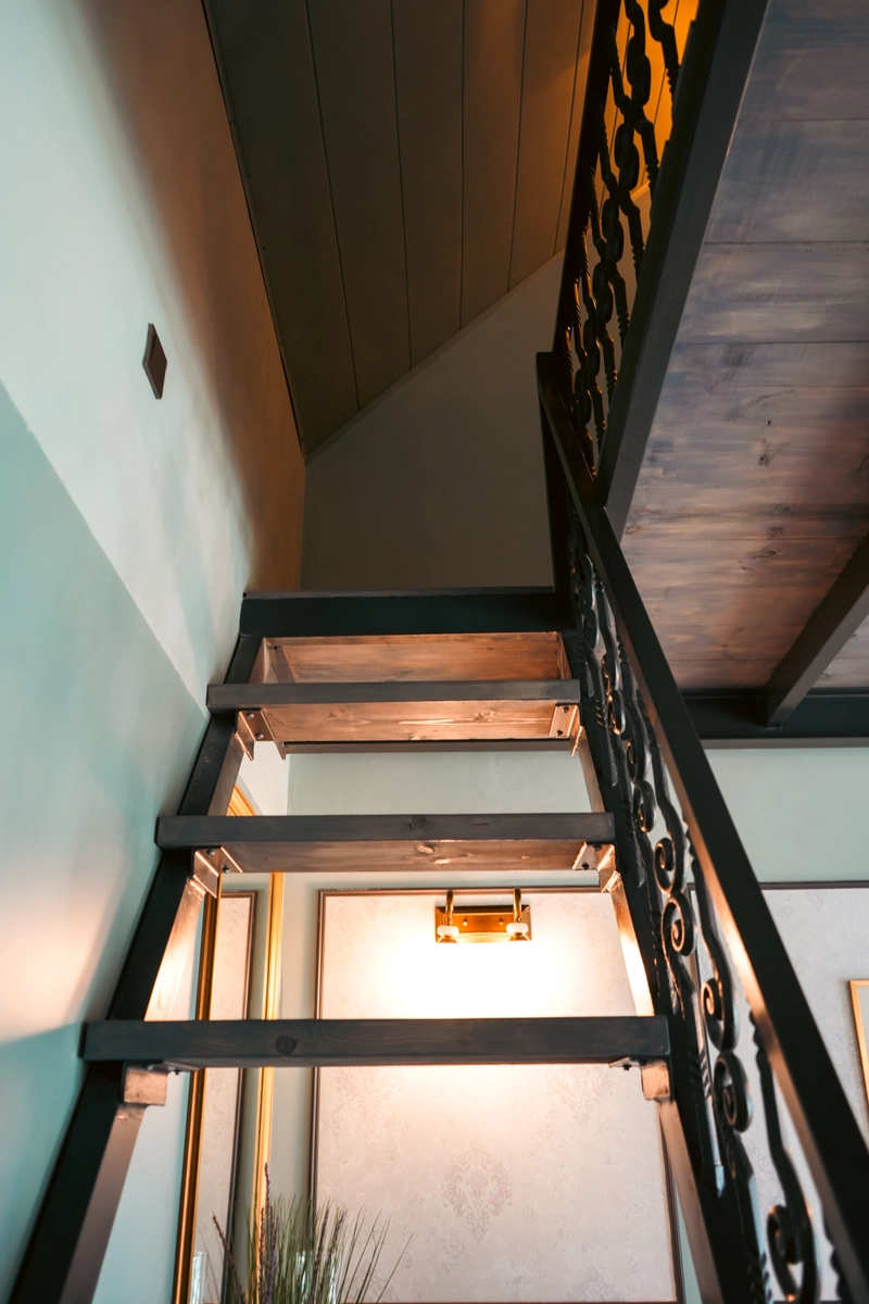 The stair up to the attic in the Superior Deluxe Family Room