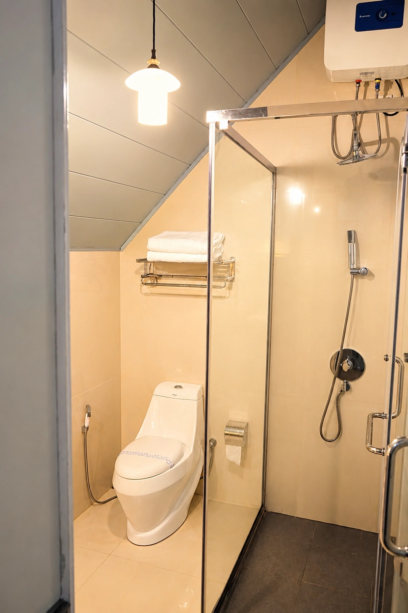 The shower room of the Superior Deluxe Family Room