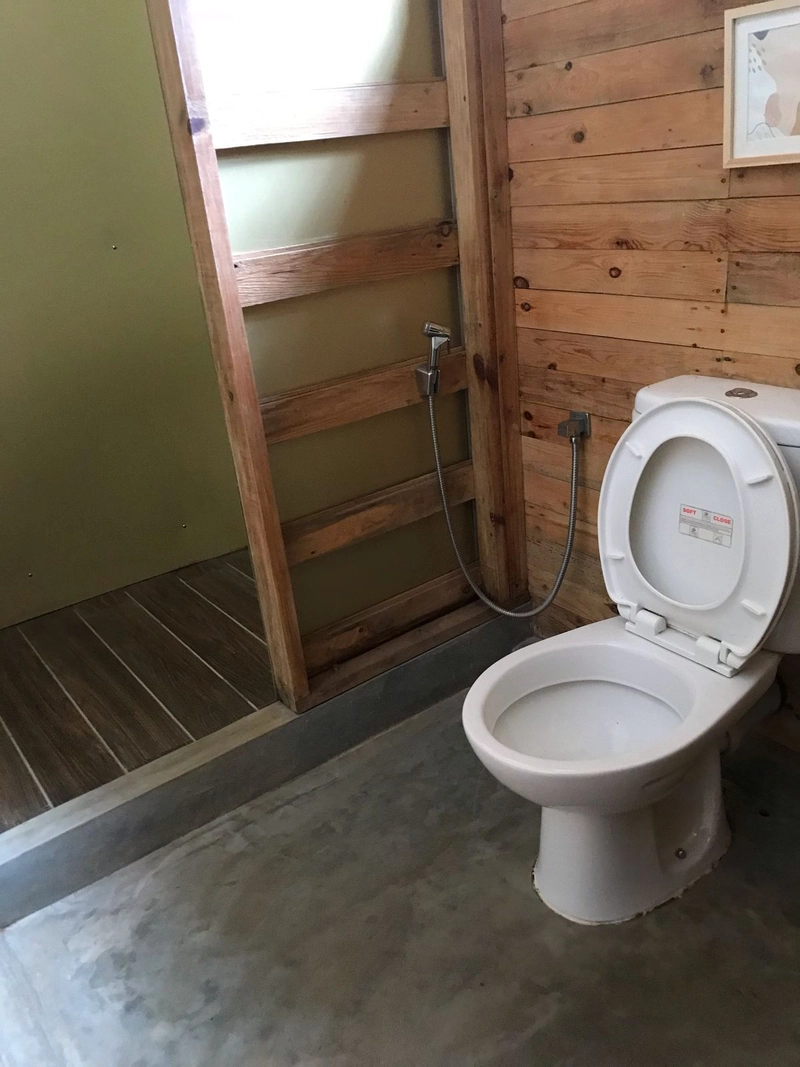 The bathroom of a Triple Room with Pool View